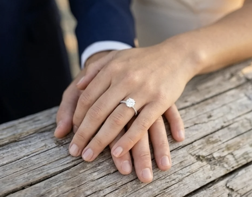 Sofia and Mateo's hands together with the engagement ring